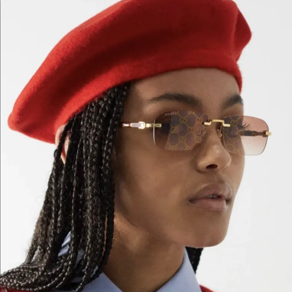 GUCCI VERY COOL ,UNISEX WITH LOGO “ GG” ON RIMLESS RECTANGULAR SUNGLASSES